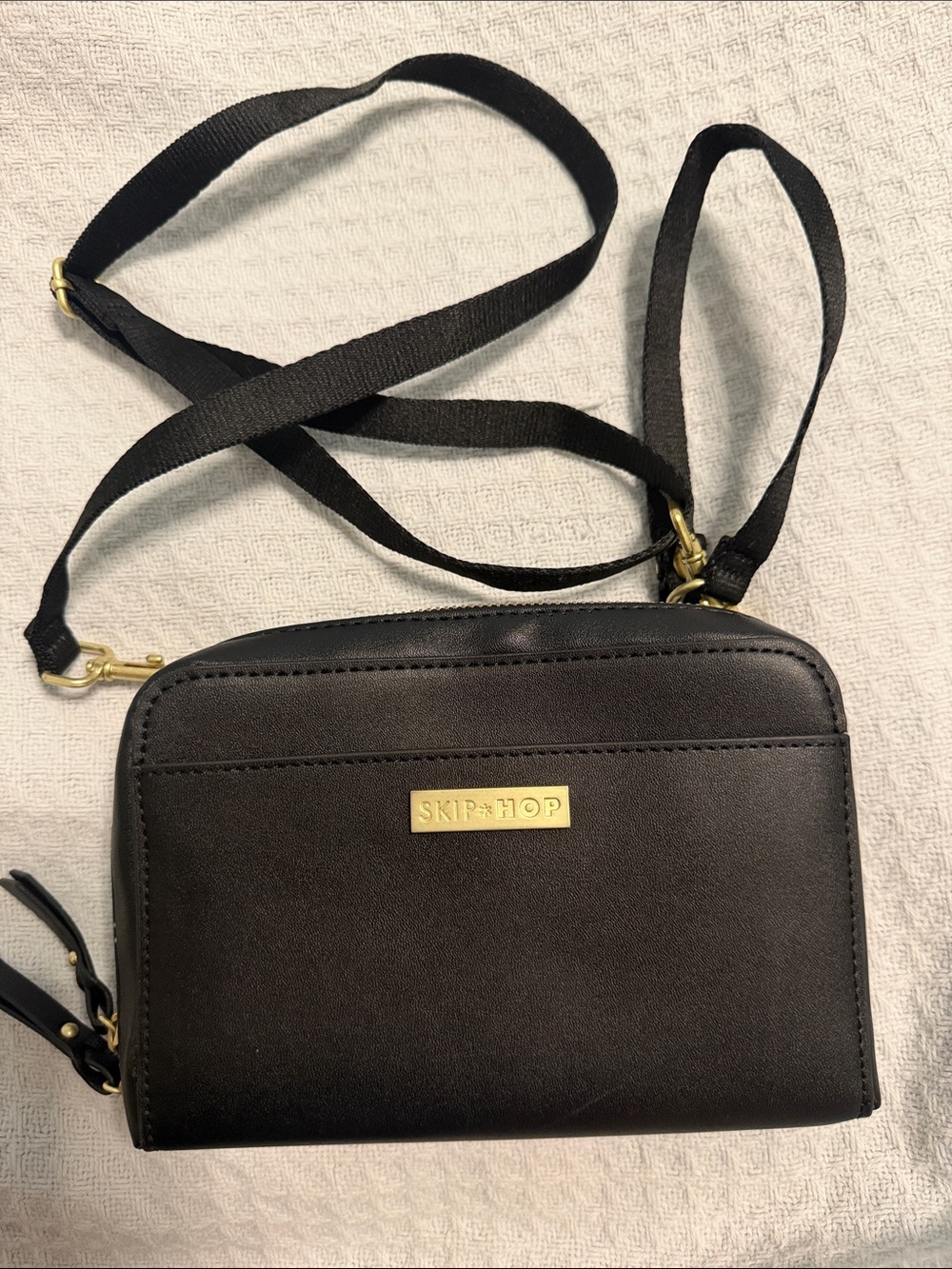 Skip Hop Black Crossbody Wallet with Gold Accents